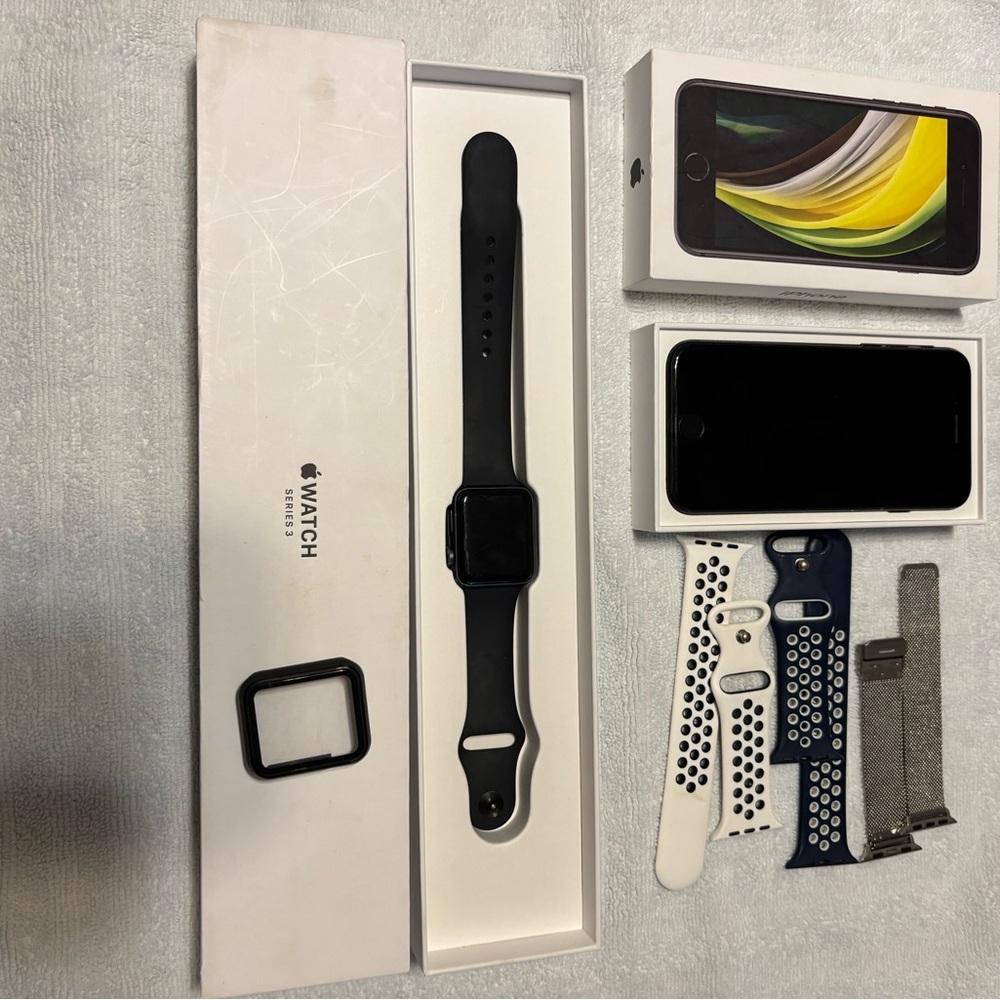 Apple Watch SE and iPhone SE with Black Case and Multiple Sport Bands